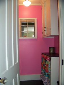 Laundry Room Featuring Pantone's Color of the Year, Honeysuckle.